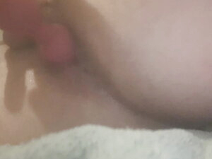 Close-up pushing out anal beads first time