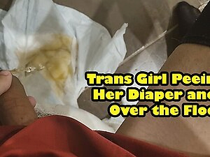 Trans Girl Peeing In Her Diaper and all Over the Floor