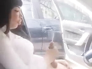 she handjob in car