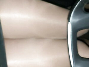 With shiny pantyhose and Katty Perry on the road by car