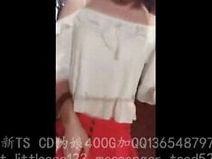 Chinese shemale struts and shows her big fat cock