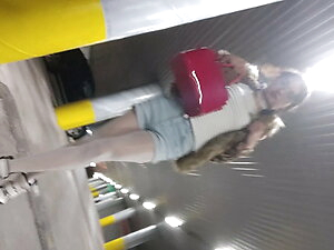 Sexy Ponnyboy defiles in the parking in his fur coat