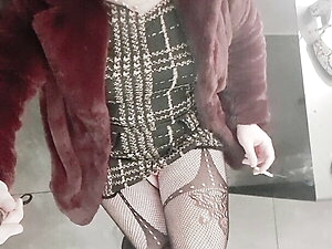 Crossdresser smoking in high heels