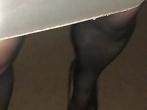 Kirsty walking in tight nylon skirt.